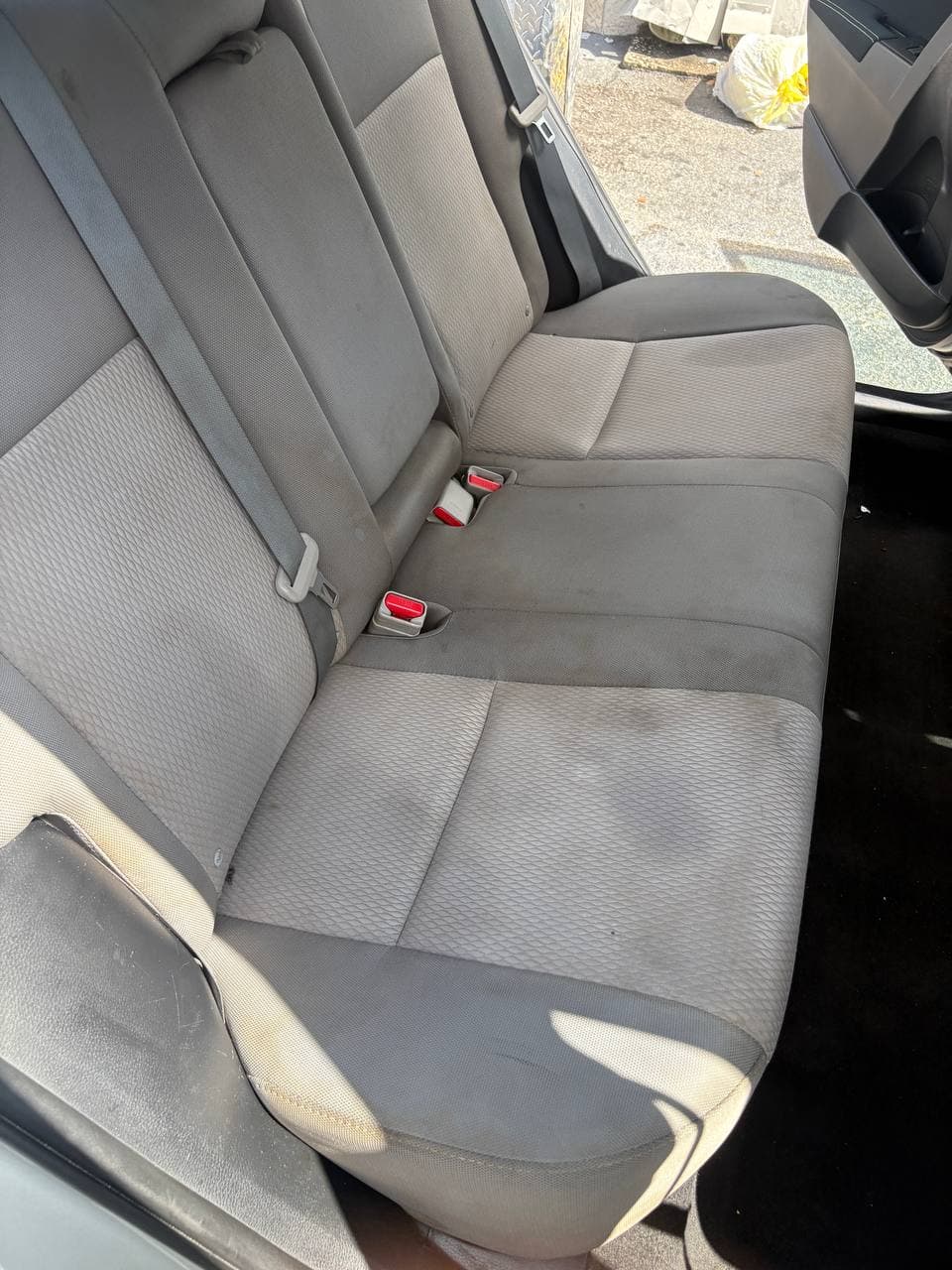 After mobile detailing showing the rear cloth bench seat cleaned
